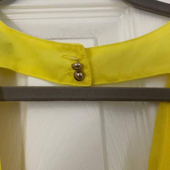 Stylish Yellow and Black Polka Dot Romper - Picture 7 of 13